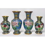 Two various pairs of Chinese cloisonne enamel vases, decorated with polychrome flowers and cloud