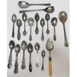 A small quantity of ornate silver souvenir spoons comprising Maine, Canada, Bermuda, Halifax, Bar