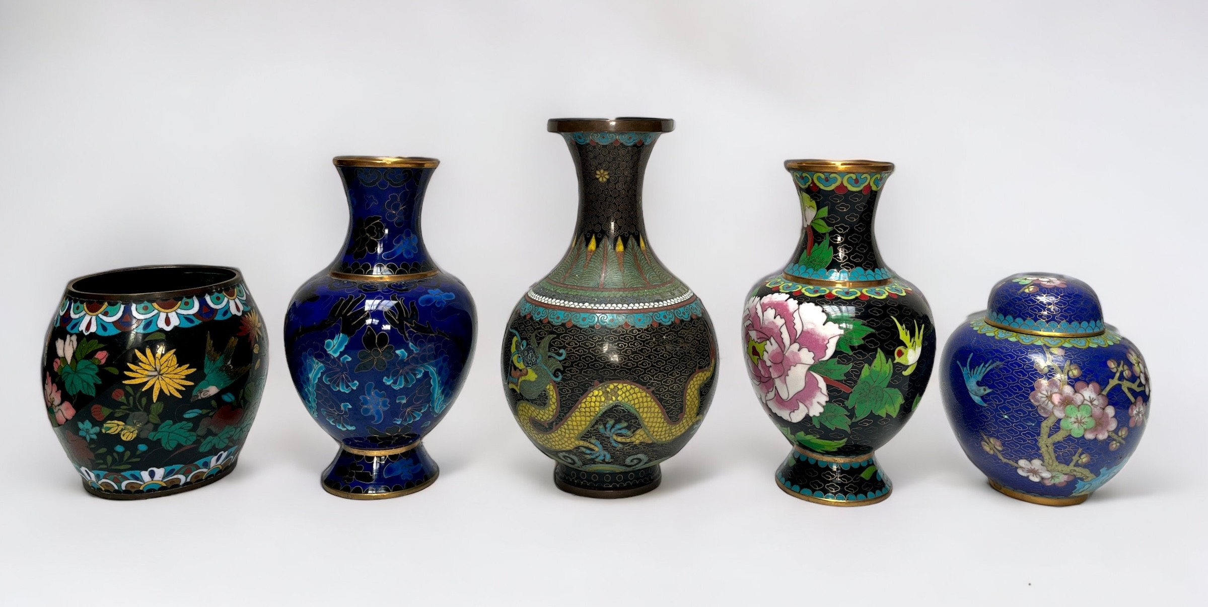 Three various Oriental cloisonné footed vases of shaft and globular form, including one depicting