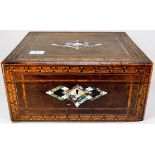 An inlaid walnut sewing box with mother-of-pearl and cross-banded decoration to the top, enclosing a