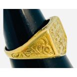 A 9ct gold signet ring, cast with The Three Lions, 5.4 grams.