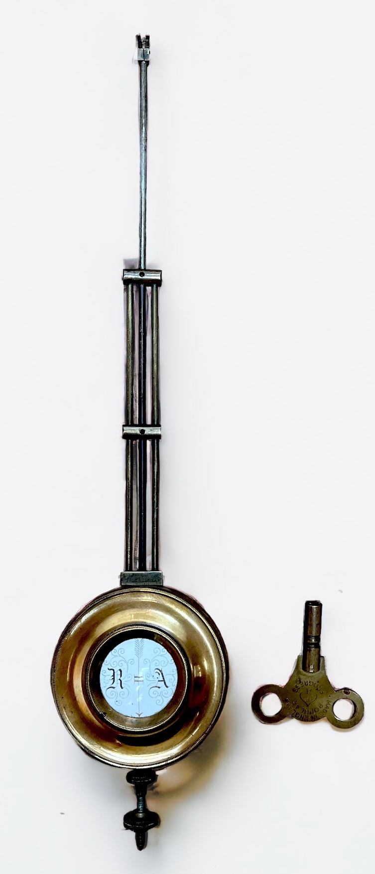 A walnut and beech cased Vienna wall clock with white enamel dial and pendulum, arched frieze - Image 2 of 2