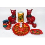 Seven assorted items of Poole Pottery Delphis pattern wares comprising a pair of Alan Clarke for