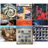 A collection of ten various 12" vinyl LP records by The Beatles, Dire Straits, Herbie Hancock, The