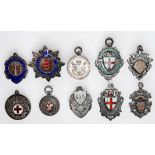 A collection of ten various early 20th Century silver football and sports medals awarded to