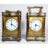 A pair of earl 20th century French miniature brass Champleve enamel carriage clocks, with white