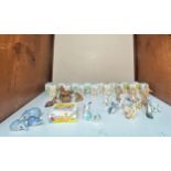 A collection of thirty-nine Wade ceramic figurines comprising, sixteen boxed Whimsie-Land figures, a