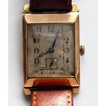 An Art Deco 9ct gold cased manual wind Rolex wristwatch, the white square enamel dial with Arabic