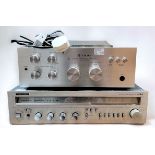 A Trio model KA-1500 stereo integrated amplifier, serial no. 551811, together with two turntables,