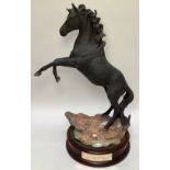 A Beswick Ware ‘Cancara The Black Horse’ Beswick Centenary matt figure of a black horse rearing,