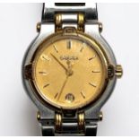 A ladies Gucci 9000L bi-colour stainless steel wristwatch, the gold dial with gold batons denoting