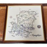 Two embroidered maps, one for Hampshire, the other England and Wales, both framed and glazed,