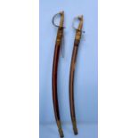 A pair of Decorative Indian Ceremonial Swords, each with 77cm curved steel blade with spear point