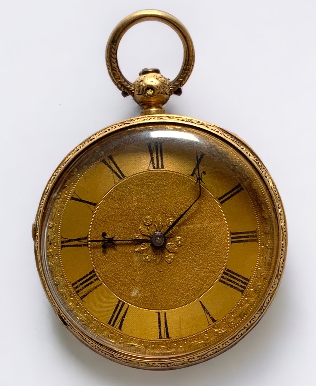 An 18ct gold cased open-face pocket watch, the gilt dial with Roman numerals denoting hours, the