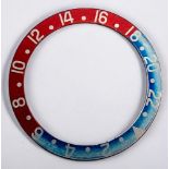 A vintage Rolex blue and red ‘Pepsi’ bezel insert, with natural ‘ghost’ patina, 37mm diameter