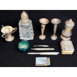 A silver small arts & crafts three-handled cup, pepper grinder and pair of spill vases, together