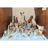 A quantity of ceramic animals by Beswick, Staffordshire, Szeiler, Goebel, Sylvac, etc.,