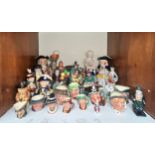 A collection of assorted Royal Doulton, Staffordshire, etc. ceramics including, The Mask Seller,