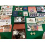 A selection of proof, brilliant uncirculated (BU) coin sets and various coins, comprising a 1993