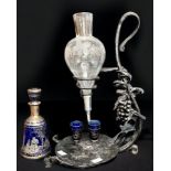 A vintage Italian wine aerator with 'fruiting vine' etched-glass decanter on wrought-iron stand,