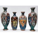 A pair of Chinese Cloisonne vases of hexagonal baluster form decorated with dragons in