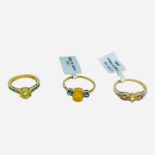 Three various 9ct yellow gold dress rings, all set with various coloured stones, total weight 7.0