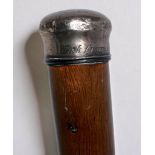 A Victorian Oak Walking Cane, the white-metal top engraved ‘Oak From Hebron 1882,’ top with