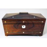 A William IV rosewood tea caddy, with mother of pearl inlay and escutcheon, enclosing central