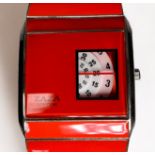 A ladies Zaza London wristwatch, in stainless steel case with coral finish and unusual three-wheel