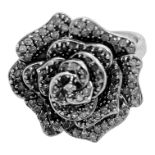 A 9ct white gold dress ring, set with small round diamonds, estimated 0.50cts, in a full bloom