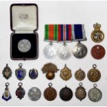 A WWII British Royal Marines Defence Medal, 1939-45 War Medal and LSGC Medal to CH. X. 1694 W.E.