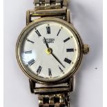 A 9ct gold ladies Citizen quartz wristwatch, the white enamel dial with Roman numerals denoting