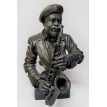 Ed Dwight (American b1933-), Patinated cast bronze bust of a saxophonist wearing a beret, raised