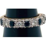 An 18ct gold sapphire and diamond half-eternity ring, claw set with 5 x Australian sapphires, and