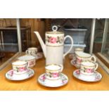 A Royal Worcester ‘Royal Garden’ pattern six-setting coffee service comprising, coffee pot, six cups