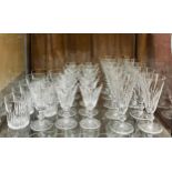 A collection of Waterford ‘Eileen’ pattern glassware, knopped stems, comprising ten fluted champagne
