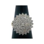 An 18ct yellow gold diamond flower cluster dress ring, set with 46 x round brilliant cut diamonds,