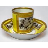 A late 18th century Sevres porcelain coffee can and saucer, of yellow ground with gilding and