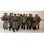 A collection of fourteen assorted early Dragon Models 1/6 scale military action figures, modelled as