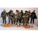 A collection of nine assorted early Dragon Models 1/6 scale military action figures, modelled as