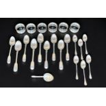 A set of six silver napkin rings, nine various 19th century fiddle-pattern teaspoons, six