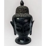 A cast bronze head of Buddah, 25cm high