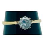 An 18ct yellow gold solitaire diamond ring, claw set with a round brilliant cut diamond, estimated