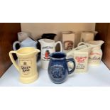 Ten various ceramic water jugs including Victoria Club, Queen Anne, and a West's Pure Tasmanian Jams