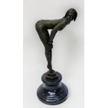 After Demetre Chiparus. cast and patinated bronze figure of a dancer in faux-snakeskin body suit,