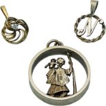 A 9ct gold St Christopher open circular pendant, together with two other 9ct gold pendants, 12.4