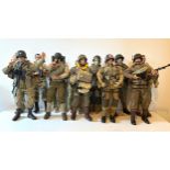 A collection of ten assorted early Dragon Models 1/6 scale military action figures, modelled as WWII