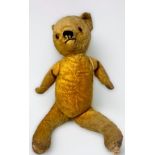 A vintage Teddy bear together with an otter by Alresford Crafts Ltd, and a stuffed terrier dog