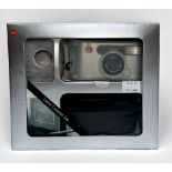 A boxed Leica ‘Creative Set’, comprising, a Leica C1 compact camera, black leather carry case, a