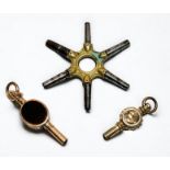 Three various pocket watch keys, one yellow metal (probably 9ct gold) example with inset